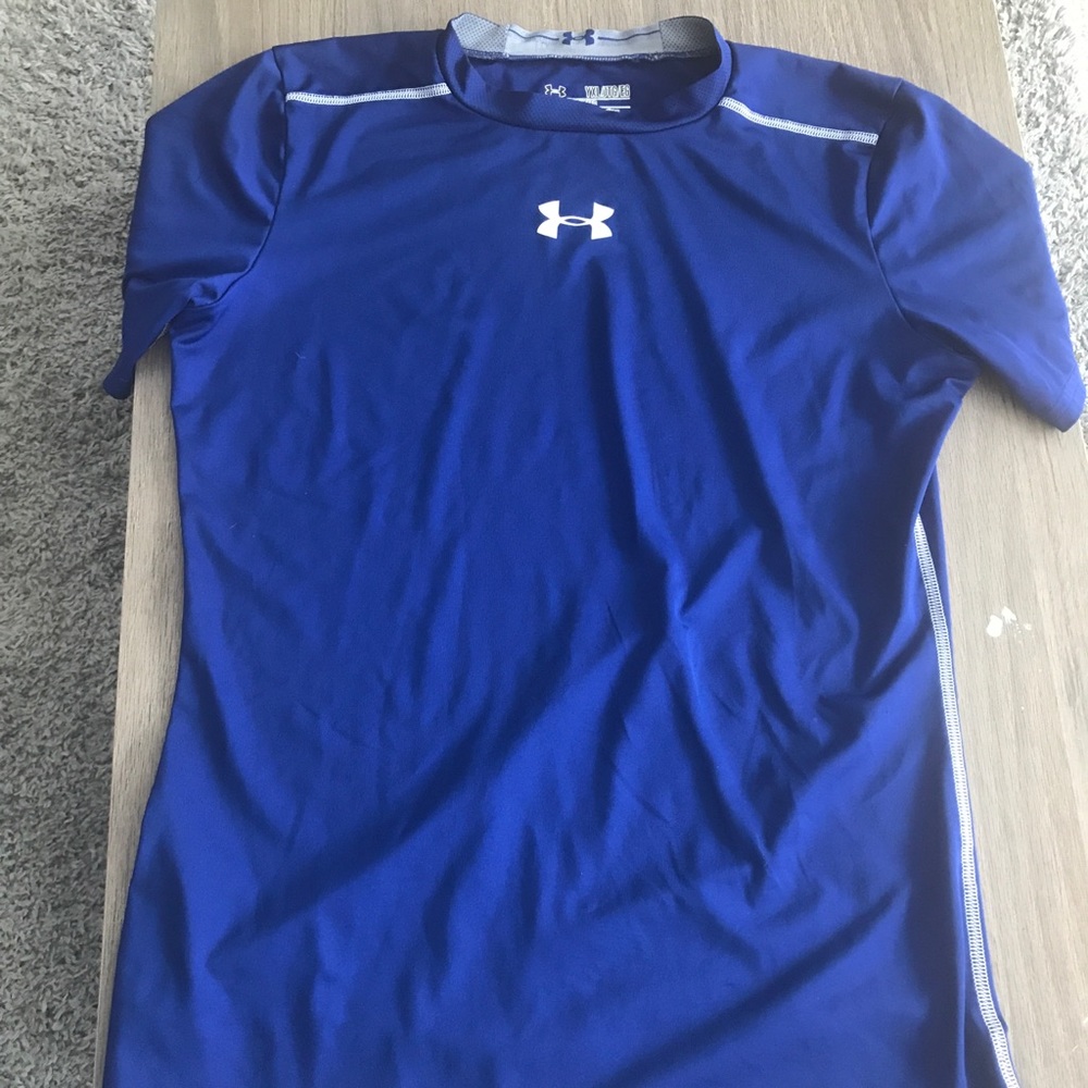 UA athletic shirt fits like a size 12